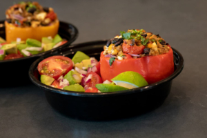 Stuffed bell pepper in a meal container.